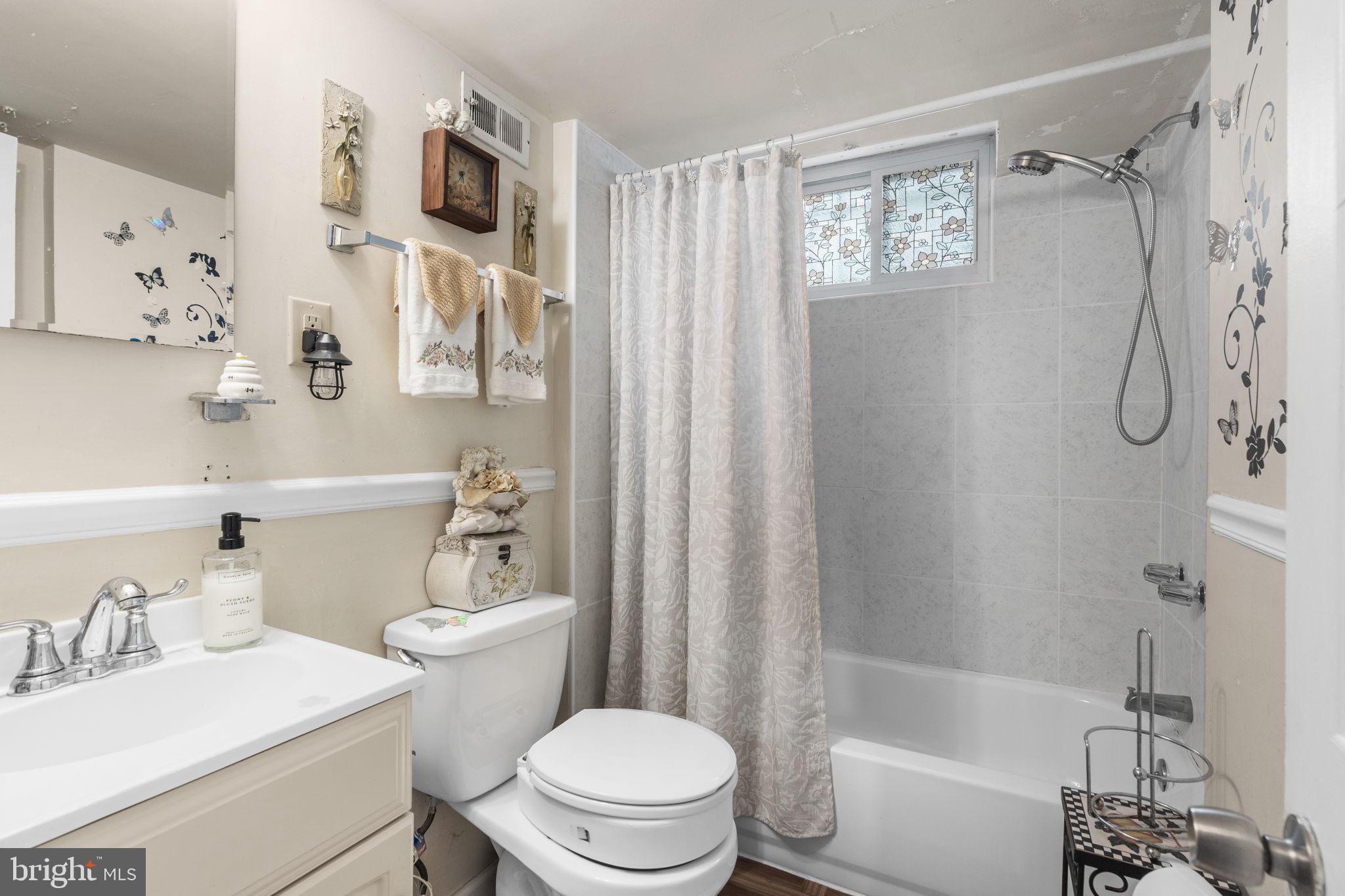6816 Pepper Street Capitol Heights, MD 20743 - Photo 10 of 12 Charming bathroom with elegant details.