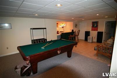 560 Royal Manor Road Easton, PA 18042 - Photo 19 of 29 a room with furniture pool table and a flat screen tv
