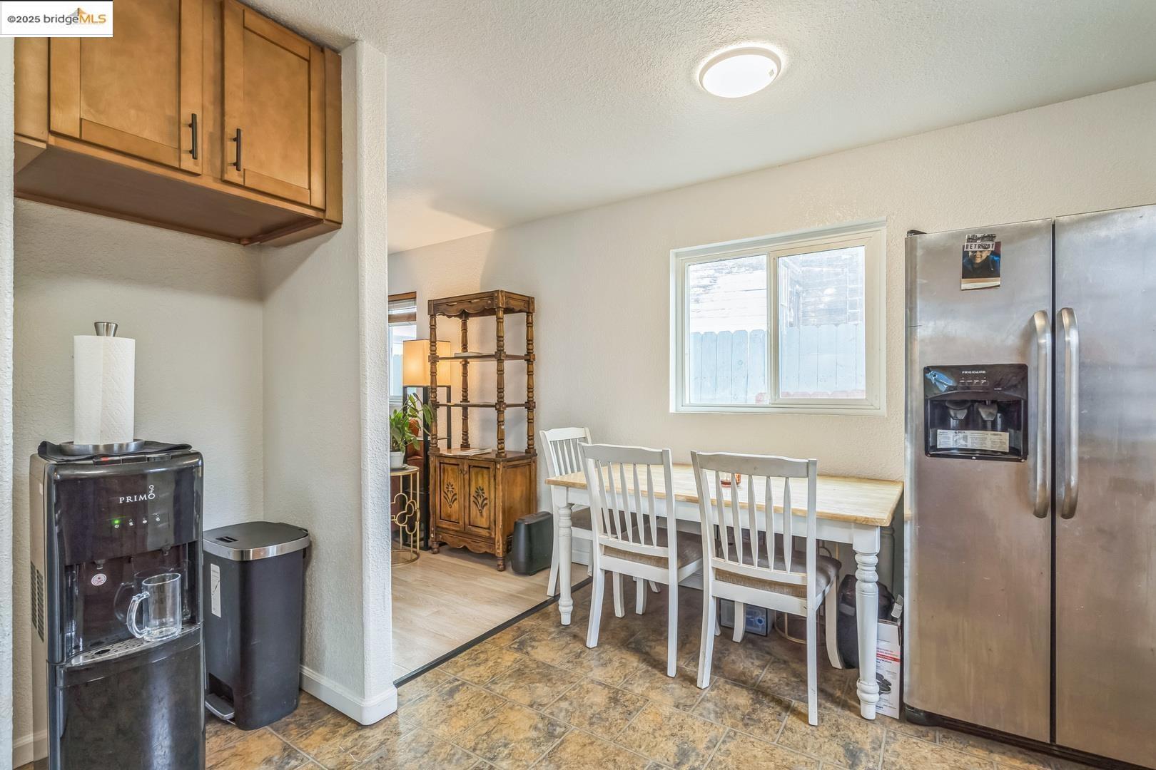 874 Pine Street Oakland, CA 94607 - Photo 12 of 32 a bedroom with furniture and a window