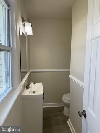 a bathroom with a sink and toilet