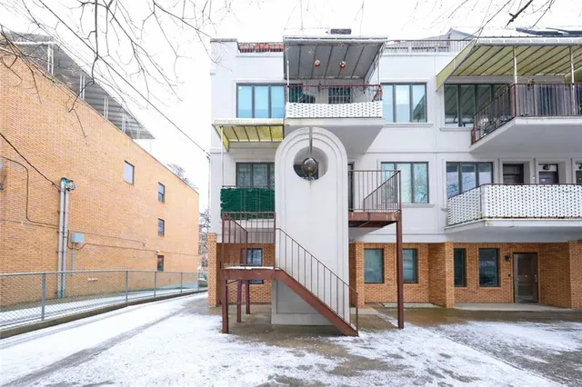 a front view of a house with a porch