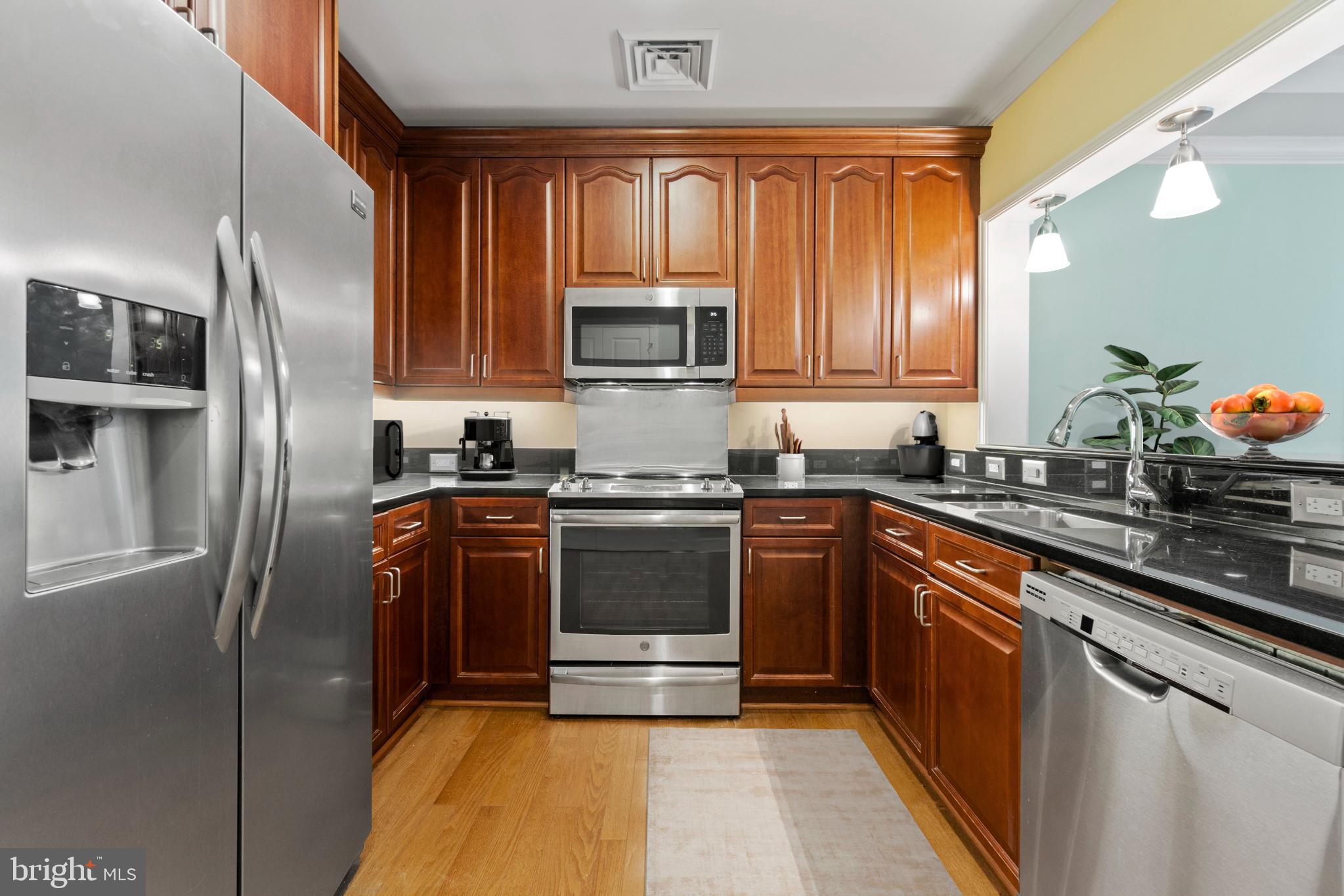 401 13th Street Northeast, Unit 112 Washington, DC 20002 - Photo 2 of 29 Stainless Appliances & 42" Cabinets