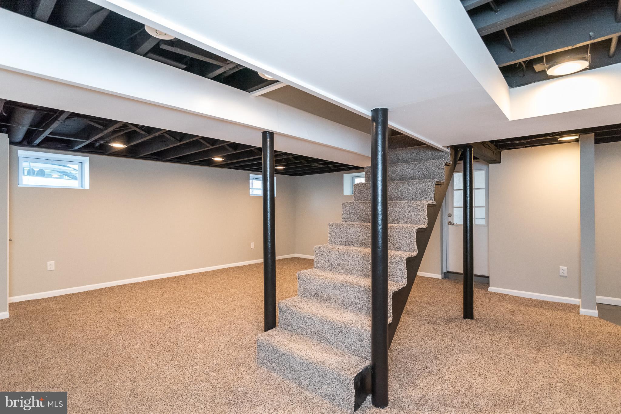 3040 Parktowne Road Baltimore, MD 21234 - Photo 37 of 50 Lower Level Recreation Room w/New Paint & Carpet