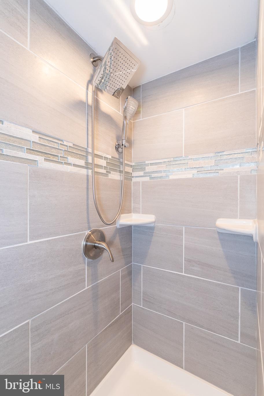 3040 Parktowne Road Baltimore, MD 21234 - Photo 43 of 50 Walk in Shower w/Ceramic Tile & glass tile inlay