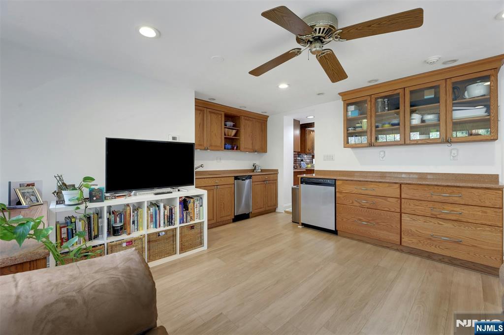 1280 Sussex Road Teaneck, NJ 07666 - Photo 15 of 36 a living room with furniture and a flat screen tv