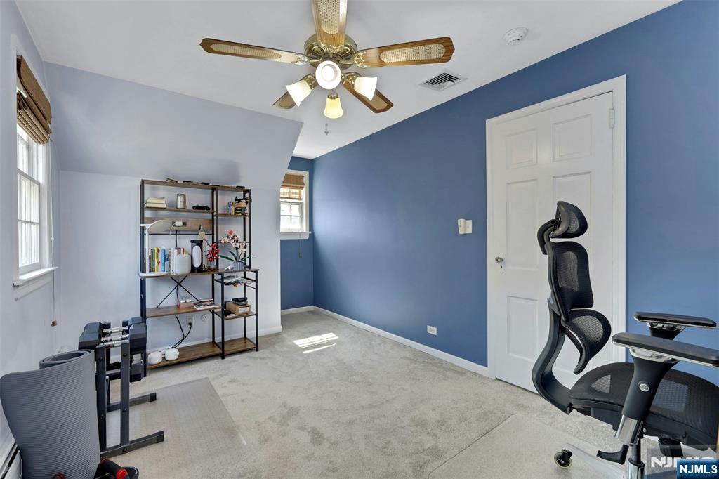 1280 Sussex Road Teaneck, NJ 07666 - Photo 22 of 36 a view of a livingroom with furniture and workspace