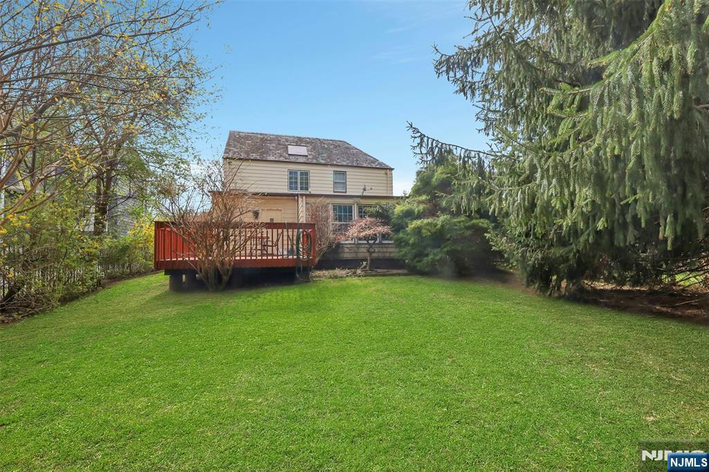 1280 Sussex Road Teaneck, NJ 07666 - Photo 33 of 36 a front view of a house with garden