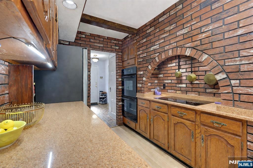1280 Sussex Road Teaneck, NJ 07666 - Photo 10 of 36 a view of a hallway with washer and dryer