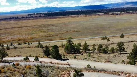 a view of a lake with mountain in the background