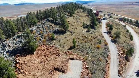 a view of an ocean and city
