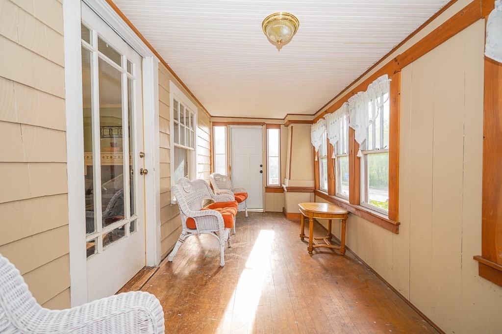 8 Worcester Road Charlton, MA 01507 - Photo 25 of 29 a living room with furniture and a large window