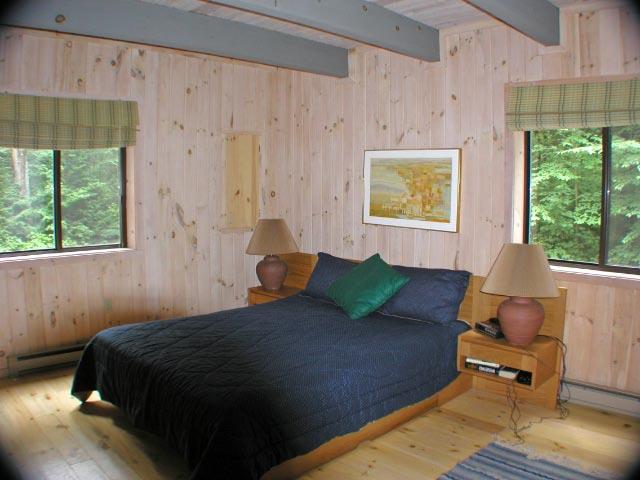34 Sitting Bull Road Becket, MA 01223 - Photo 7 of 9 a bedroom with a bed and window