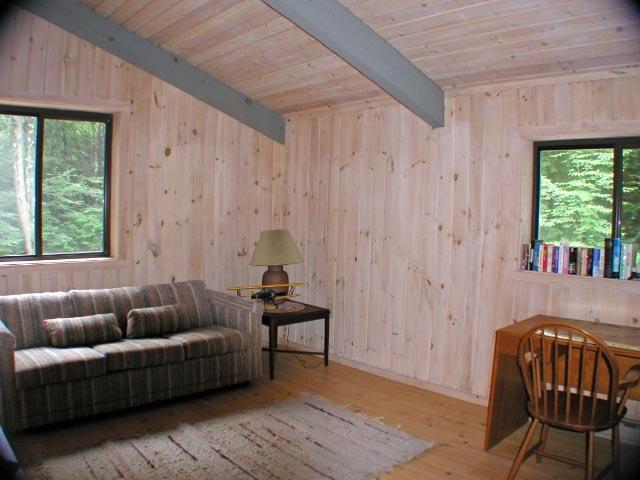 34 Sitting Bull Road Becket, MA 01223 - Photo 9 of 9 a living room with furniture and a window