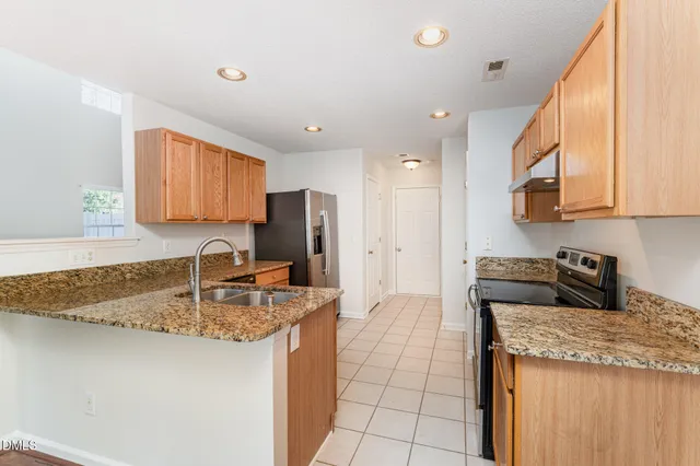 $395,000 | 9800 Treymore Drive, Raleigh, NC 27617