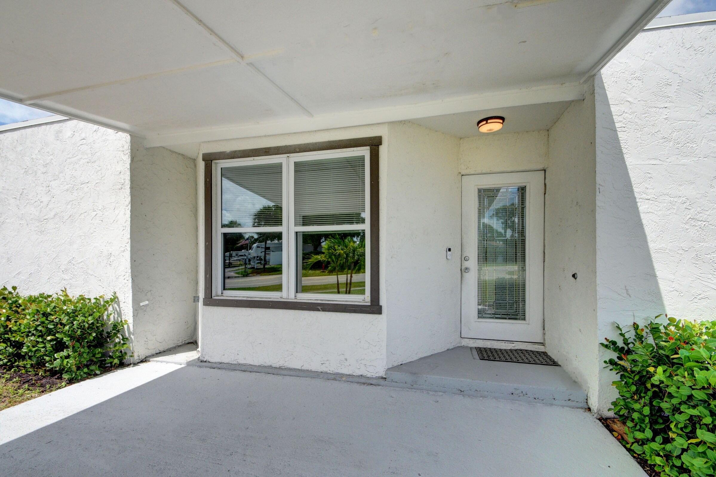 599 Owosso Road Lake Worth, FL 33462 - Photo 2 of 20 599 Front Porch