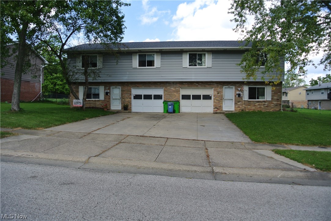 4418-4422 Maplepark Road Stow, OH 44224 - Photo 1 of 32 View of front of home featuring garage and a front yard