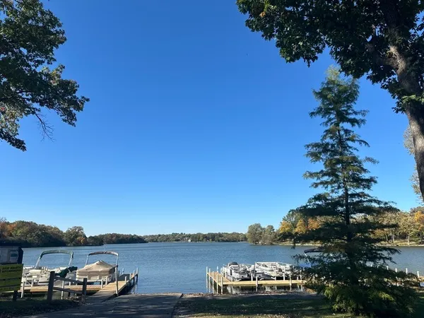 a car parked on the side of a lake