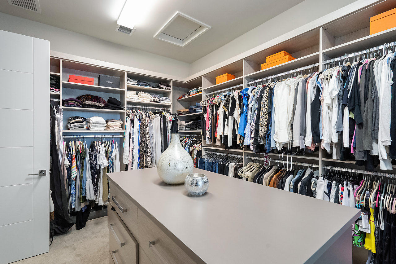 17566 Grand Este Way Boca Raton, FL 33496 - Photo 27 of 116 a view of walk in closet with clothes and shoes