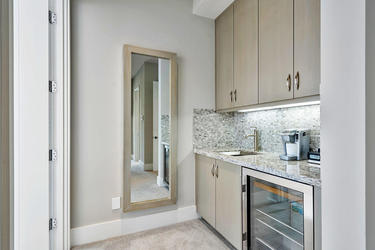 17566 Grand Este Way Boca Raton, FL 33496 - Photo 28 of 116 a kitchen with stainless steel appliances granite countertop a sink and dishwasher with white cabinets