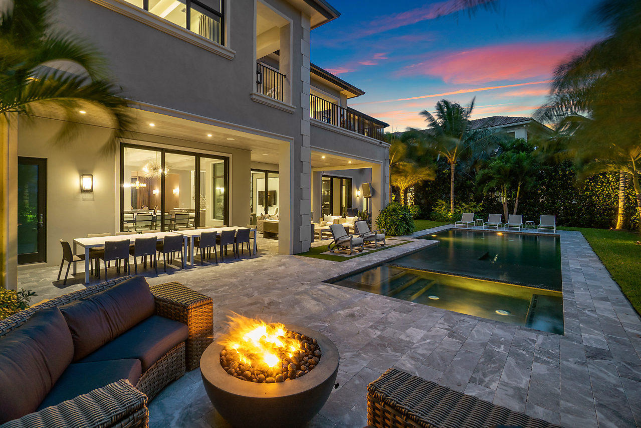 17566 Grand Este Way Boca Raton, FL 33496 - Photo 49 of 116 a view of a swimming pool with couches and lounge chairs