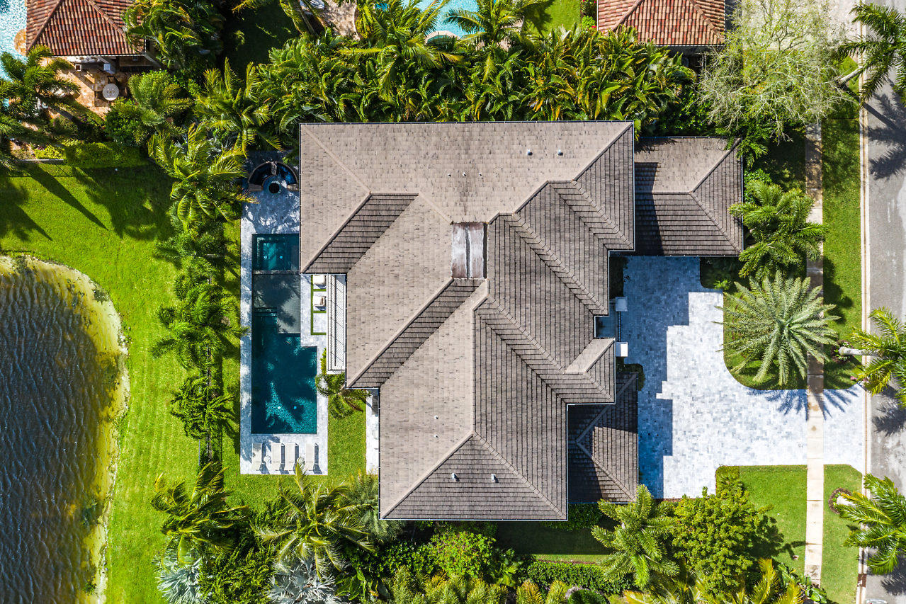 17566 Grand Este Way Boca Raton, FL 33496 - Photo 70 of 116 an aerial view of a house with a yard and potted plants