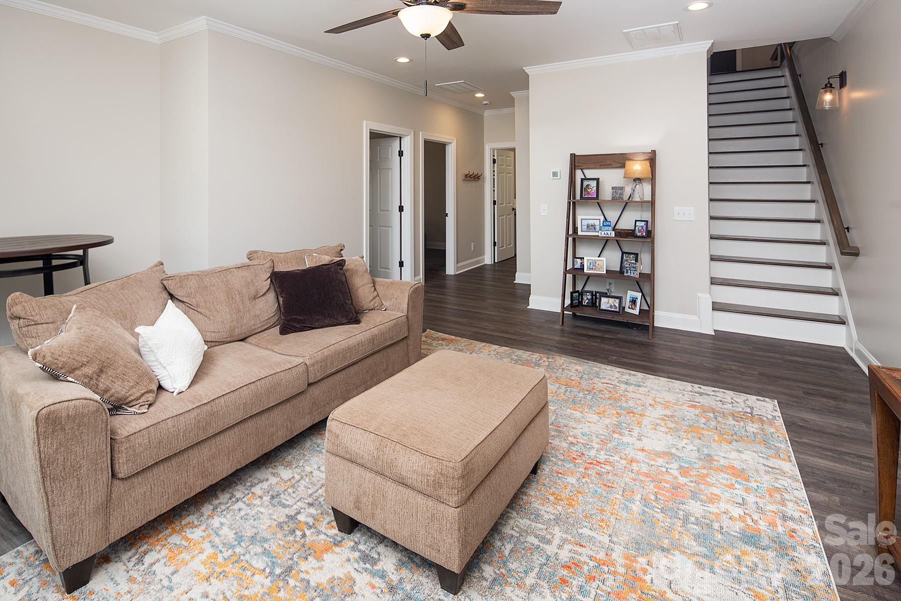 689 Emerald Shores Road Mount Gilead, NC 27306 - Photo 30 of 46 a living room with furniture and wooden floor