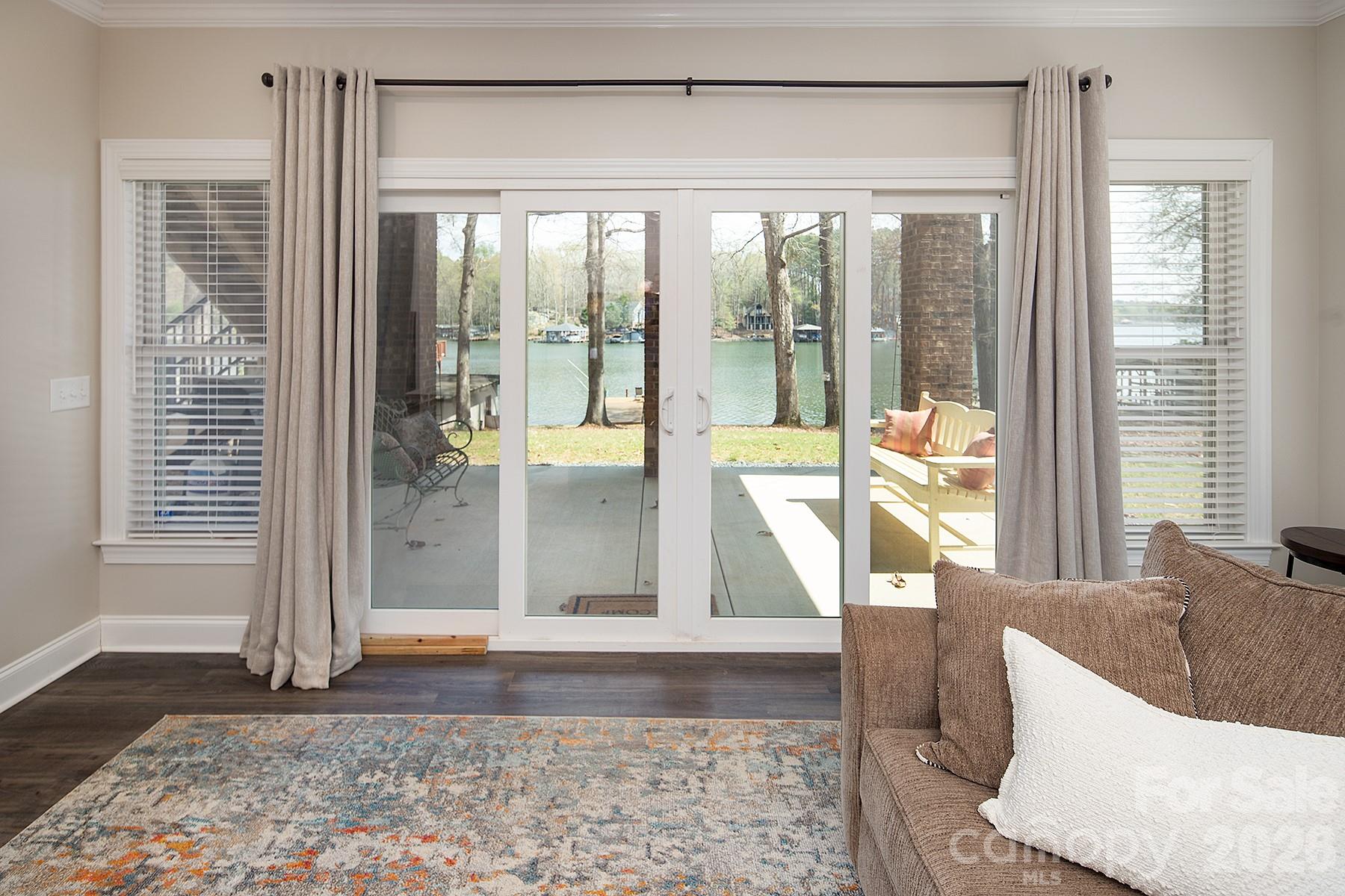 689 Emerald Shores Road Mount Gilead, NC 27306 - Photo 32 of 46 a view of an entryway with a floor to ceiling window