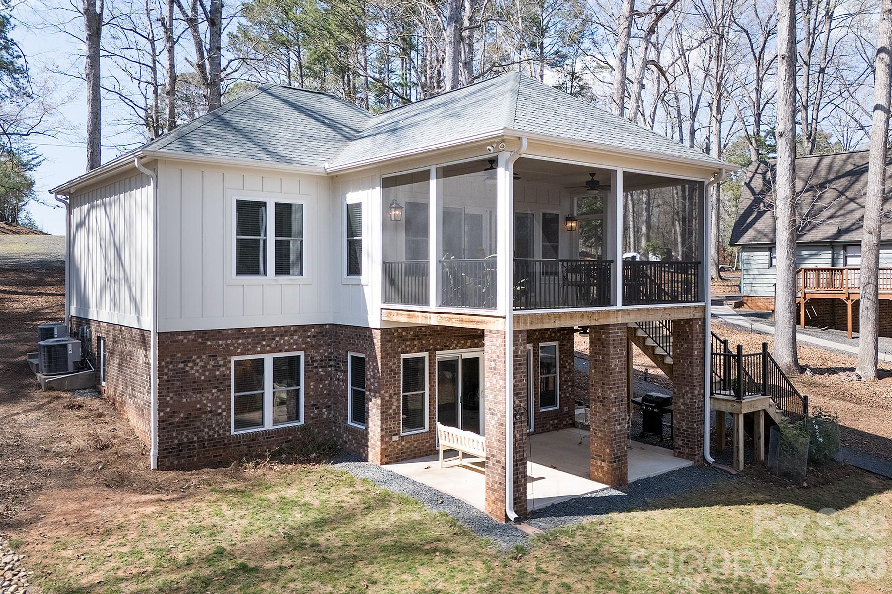 689 Emerald Shores Road Mount Gilead, NC 27306 - Photo 44 of 46 a view of a house with a large window