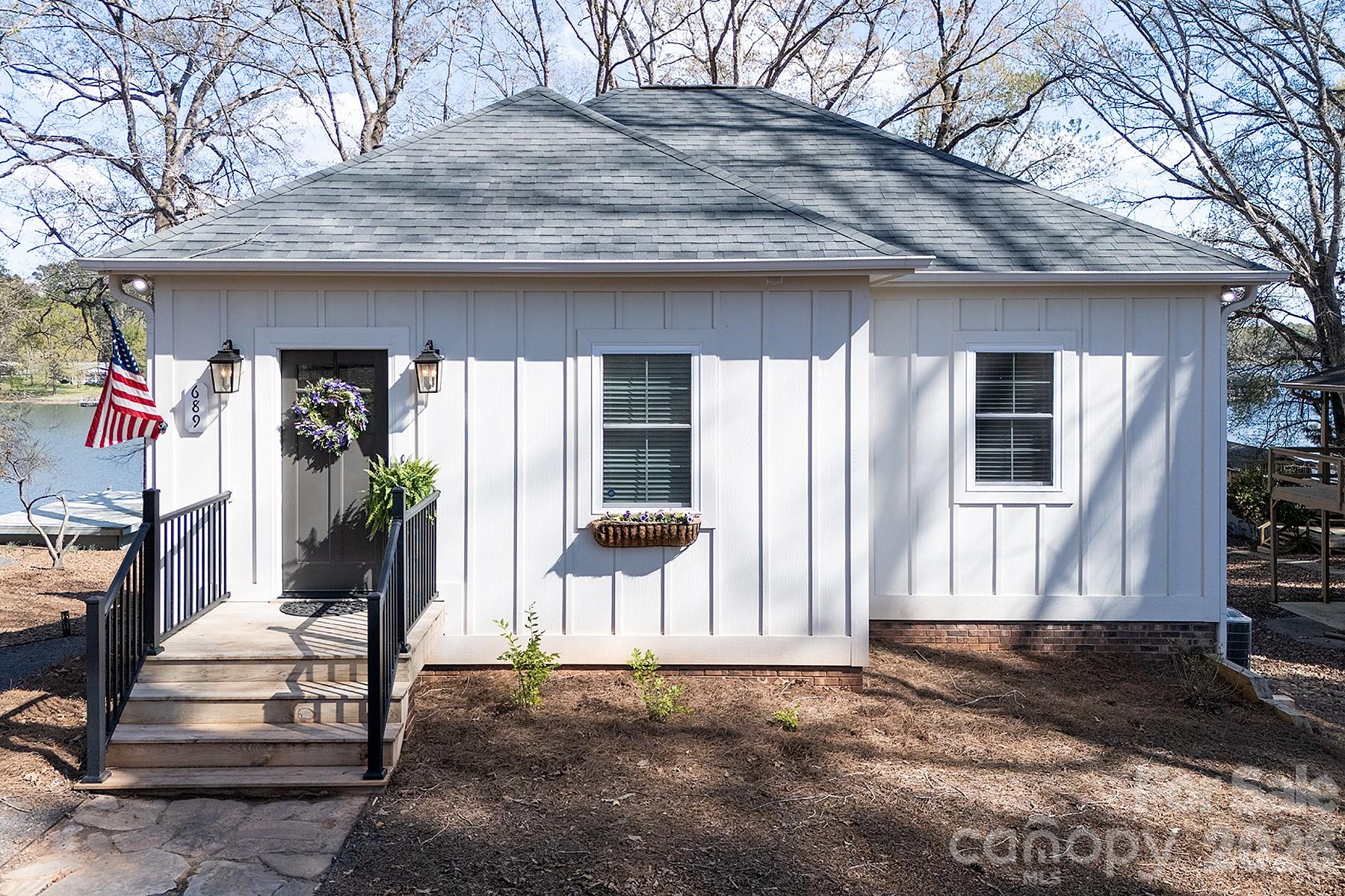 689 Emerald Shores Road Mount Gilead, NC 27306 - Photo 45 of 46 a view of a house with a outdoor space