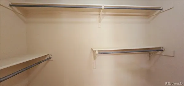 a view of a room with racks on the wall