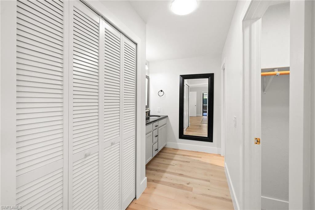 130 Torrey Pines Point Naples, FL 34113 - Photo 25 of 44 a view of a hallway with a white door
