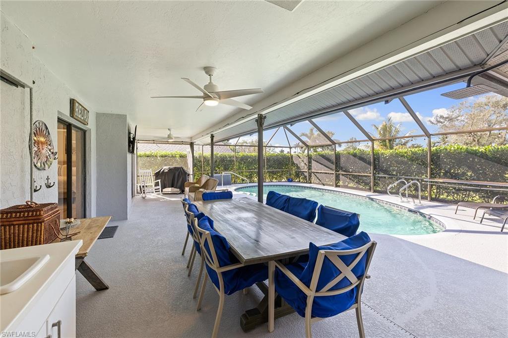 130 Torrey Pines Point Naples, FL 34113 - Photo 37 of 44 a view of a dining room with furniture window and outside view
