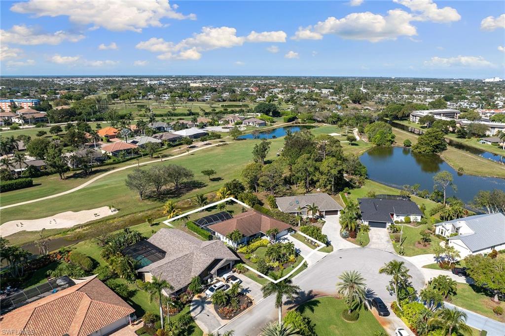 130 Torrey Pines Point Naples, FL 34113 - Photo 44 of 44 an aerial view of residential houses with outdoor space