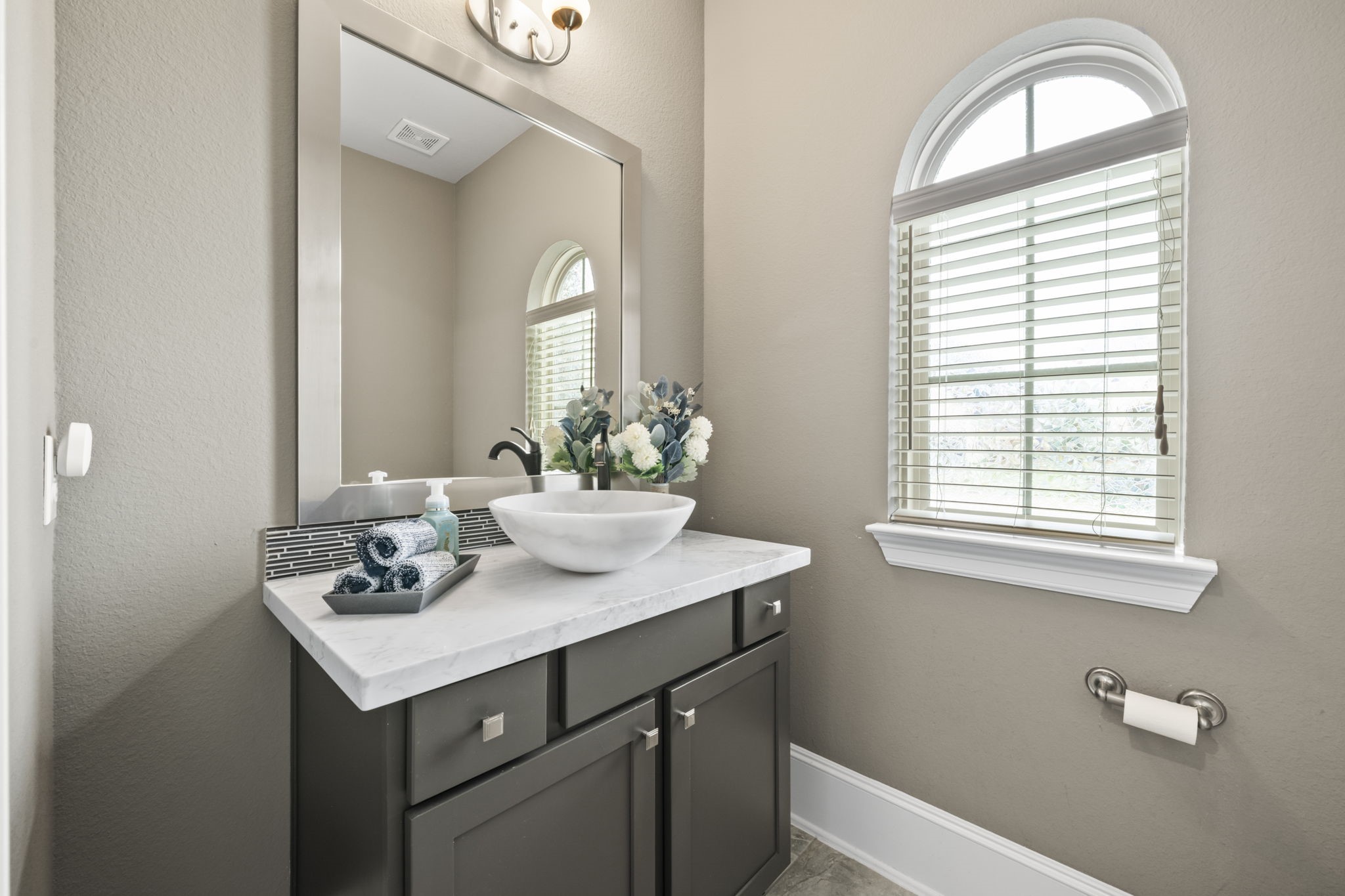 3938 Avalon Ridge Drive Spring, TX 77386 - Photo 14 of 49 The powder room is nicely tucked away near the garage entry