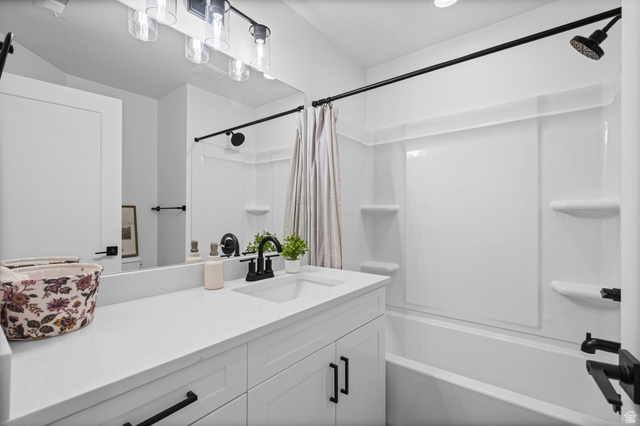 340 East 7635 S Street Sandy, UT 84047 - Photo 21 of 32 Bathroom with vanity and shower / bath combo with shower curtain