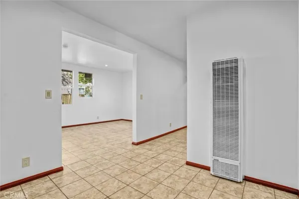 a picture of a bench in front of a wall