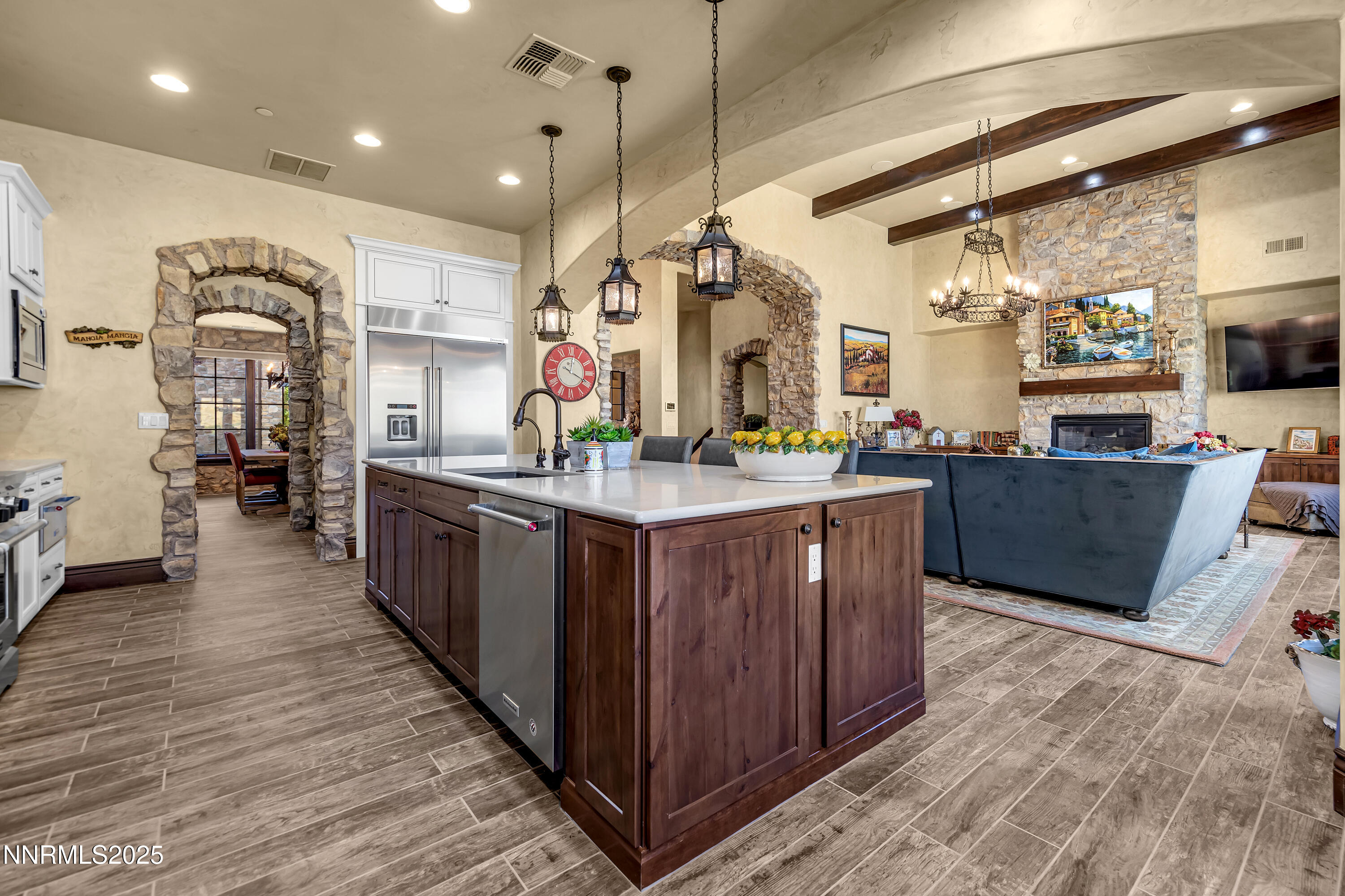 3166 Vista Favoloso Reno, NV 89519 - Photo 14 of 81 a large kitchen with stainless steel appliances kitchen island granite countertop a large counter top and stove