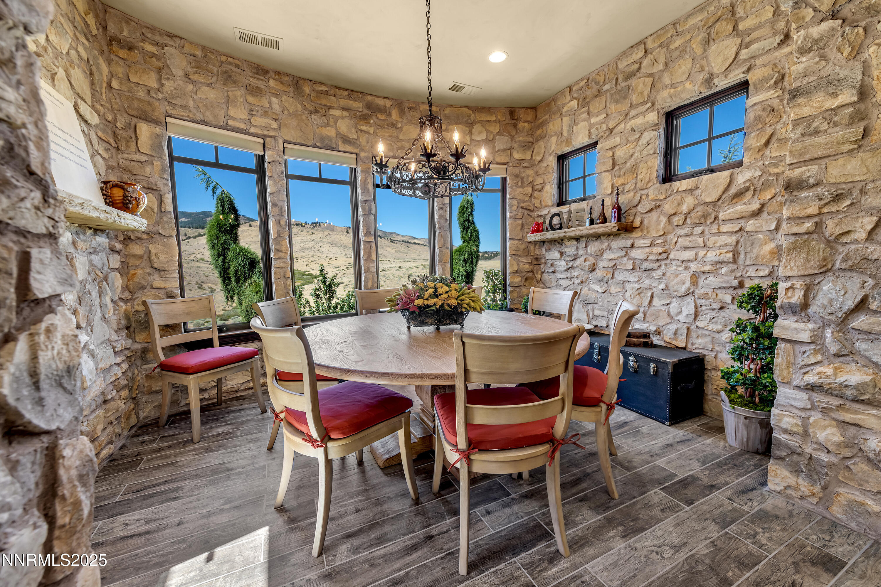 3166 Vista Favoloso Reno, NV 89519 - Photo 18 of 81 a dining room with furniture a chandelier and window