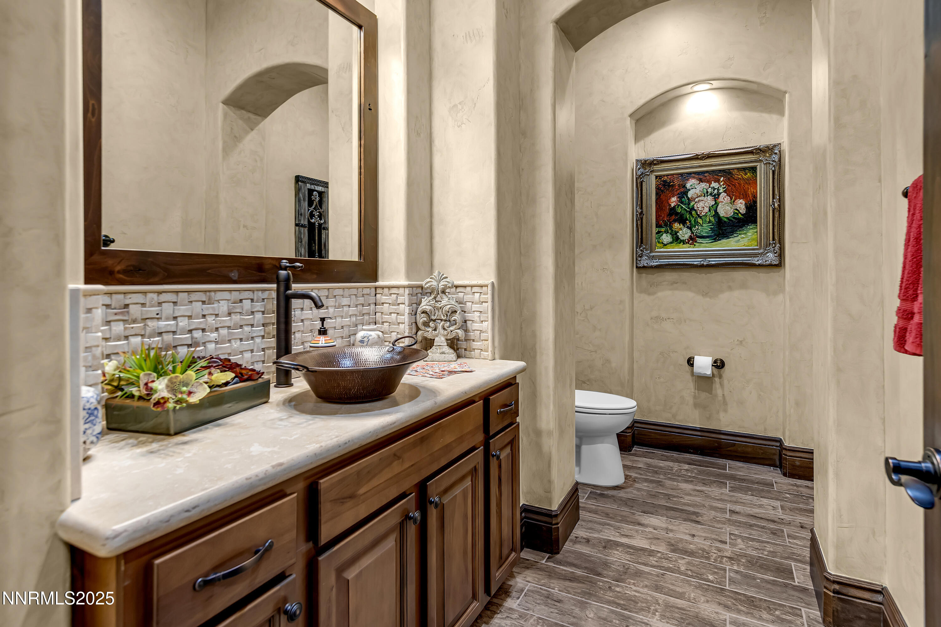 3166 Vista Favoloso Reno, NV 89519 - Photo 34 of 81 a bathroom with a sink a toilet and a mirror