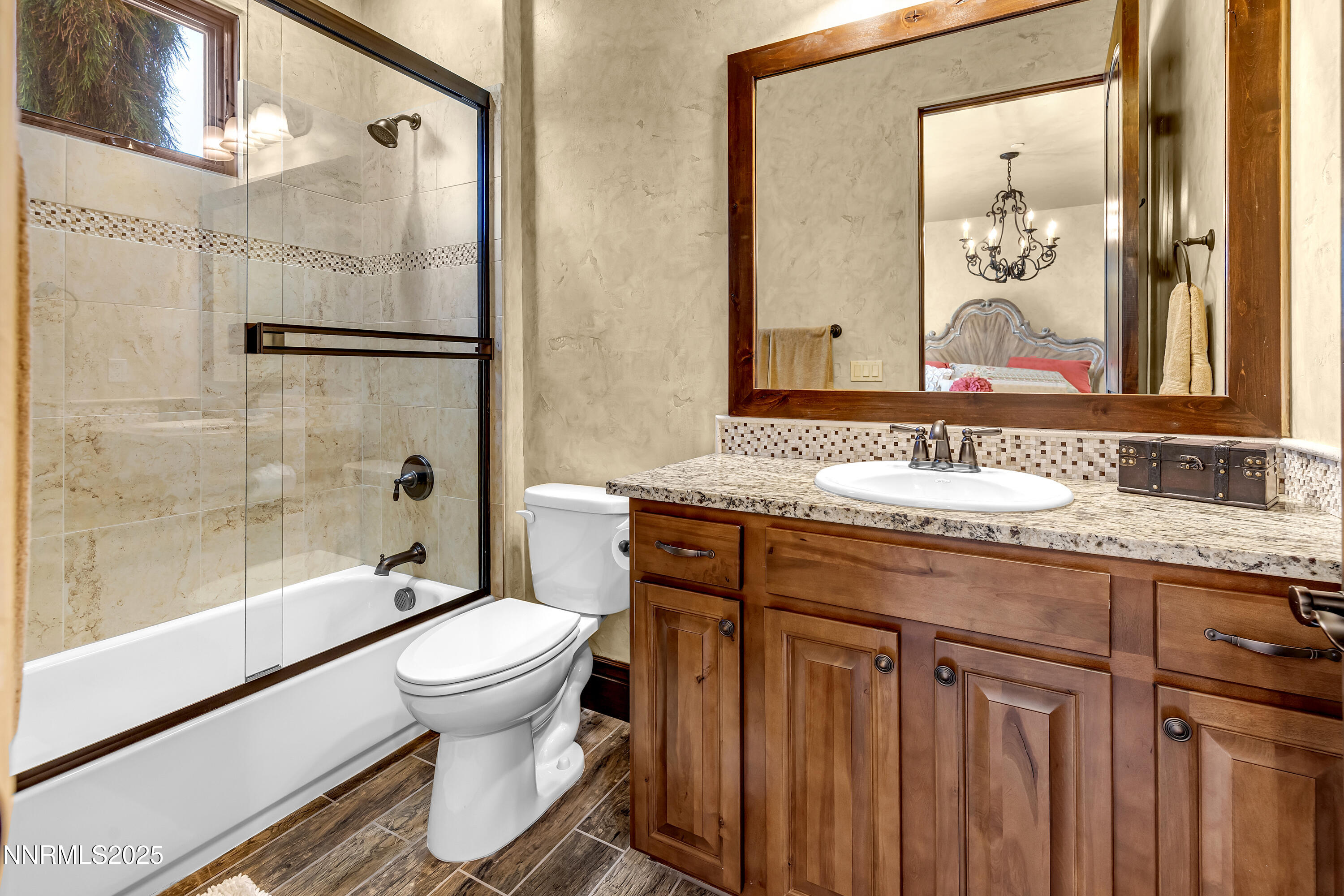 3166 Vista Favoloso Reno, NV 89519 - Photo 44 of 81 a bathroom with a granite countertop sink toilet and shower