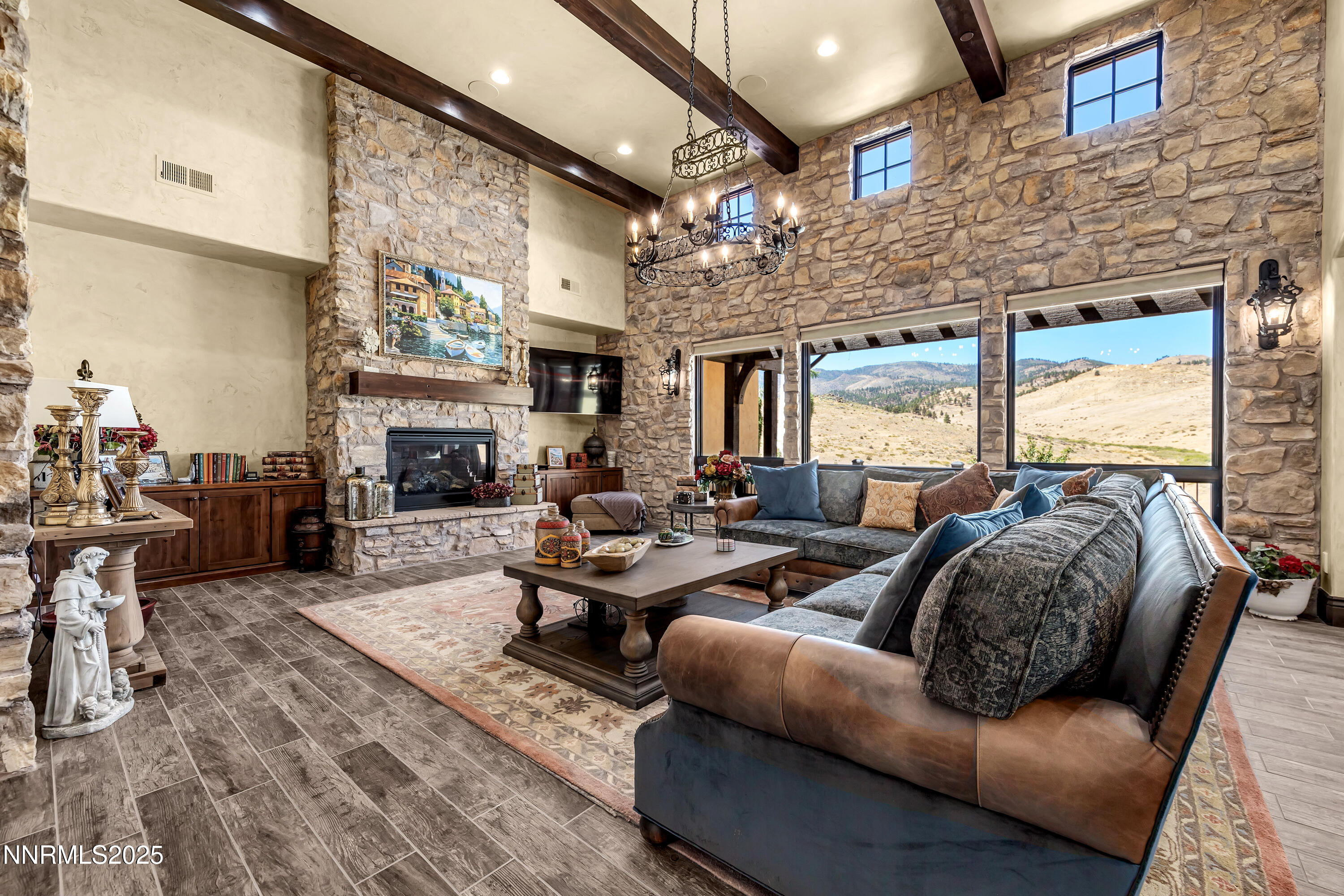 3166 Vista Favoloso Reno, NV 89519 - Photo 5 of 81 a living room with furniture fireplace and a large window