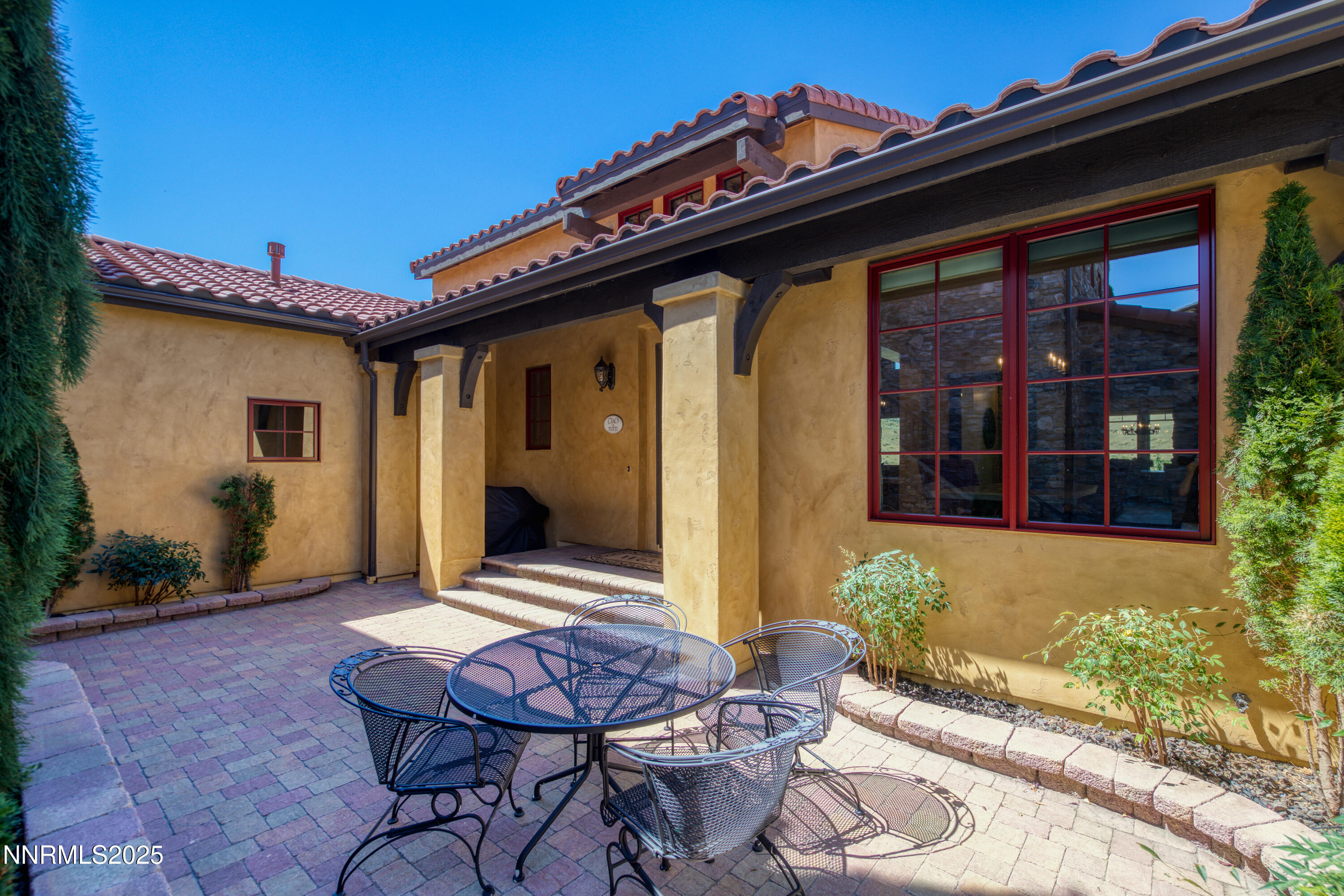 3166 Vista Favoloso Reno, NV 89519 - Photo 68 of 81 a backyard of a house with table and chairs