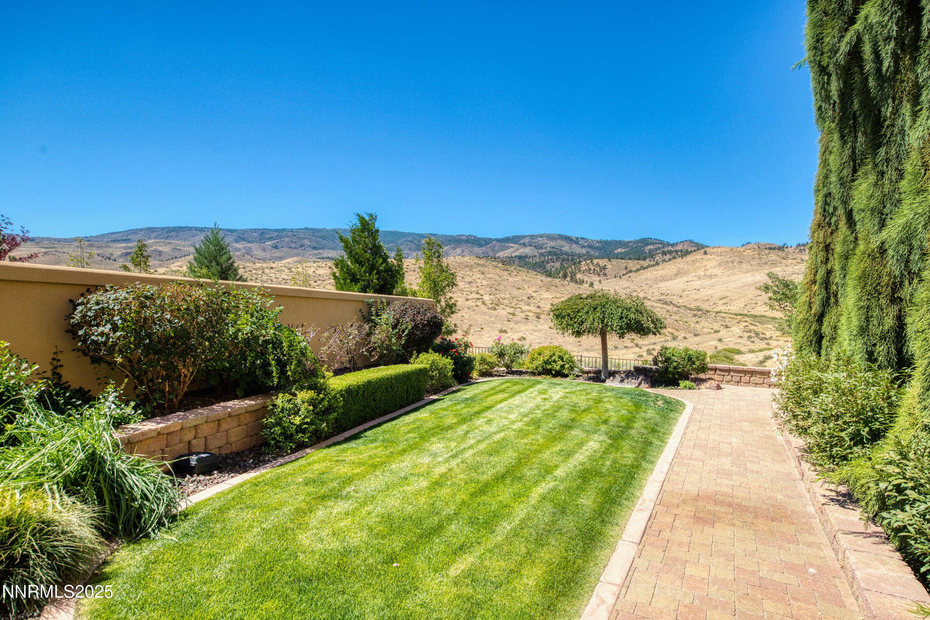 3166 Vista Favoloso Reno, NV 89519 - Photo 75 of 81 a view of a terrace with a garden