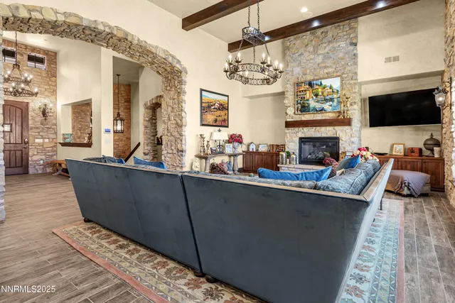 a kitchen with cabinets a sink and chairs