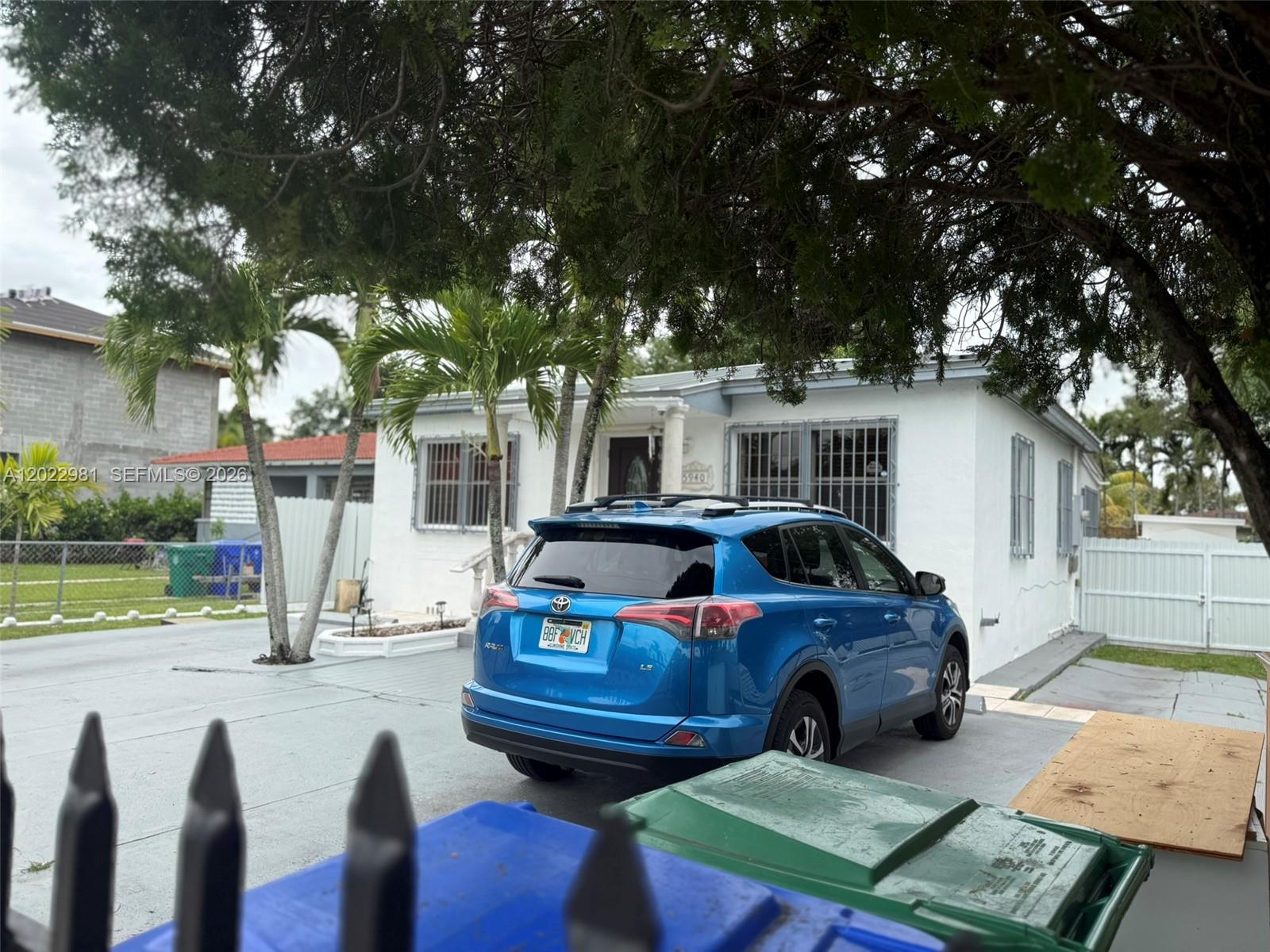 5940 Southwest 2nd Street Miami, FL 33144 - Photo 3 of 22 a view of a yard in front of house