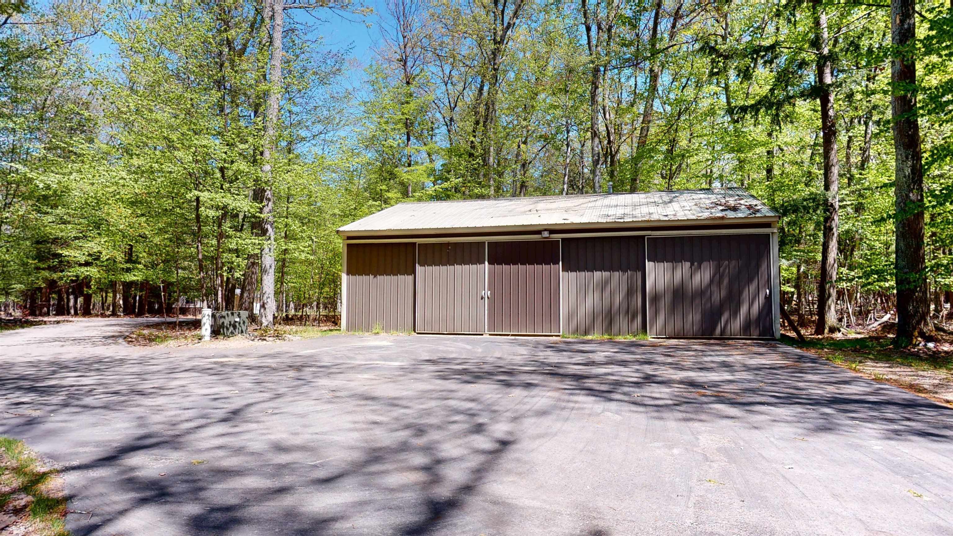 8645 Skegemog Point Road Williamsburg, MI 49690 - Photo 21 of 71