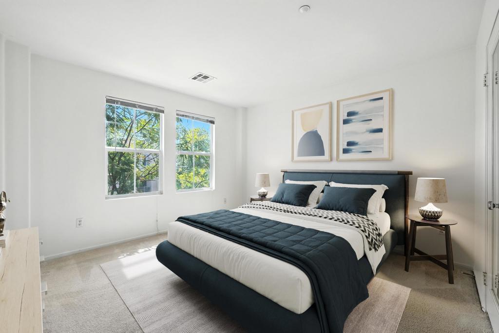 1569 Hackberry Place Chula Vista, CA 91915 - Photo 6 of 23 a bedroom with a bed and a window