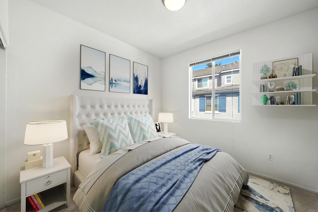 1569 Hackberry Place Chula Vista, CA 91915 - Photo 10 of 23 a bedroom with a bed and a window