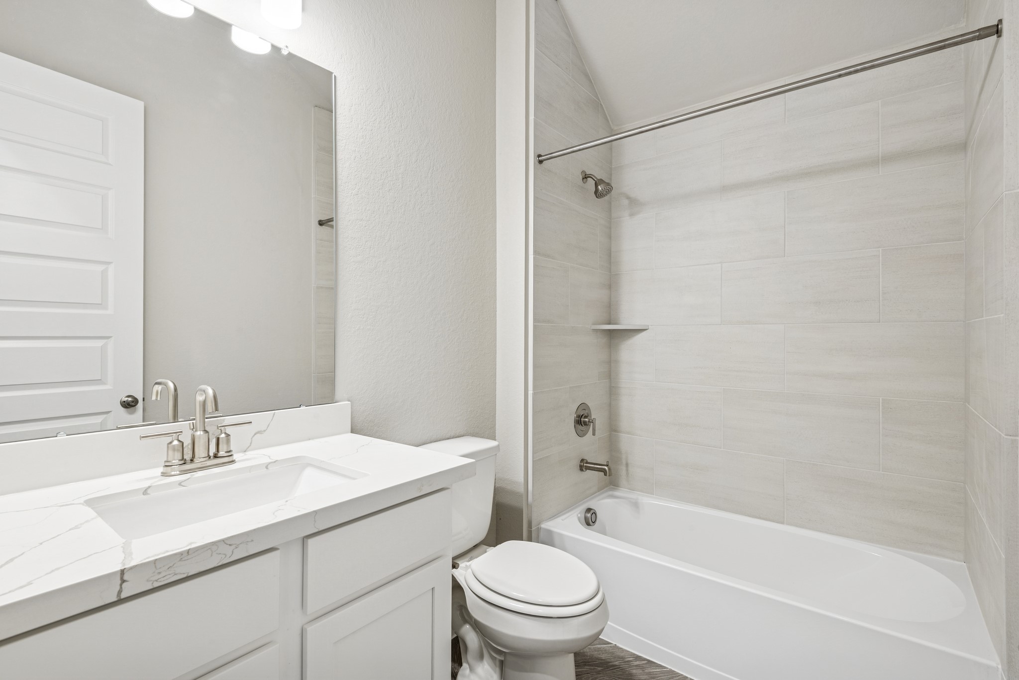 6715 Allens Landing Needville, TX 77461 - Photo 16 of 40 a bathroom with a sink toilet and shower