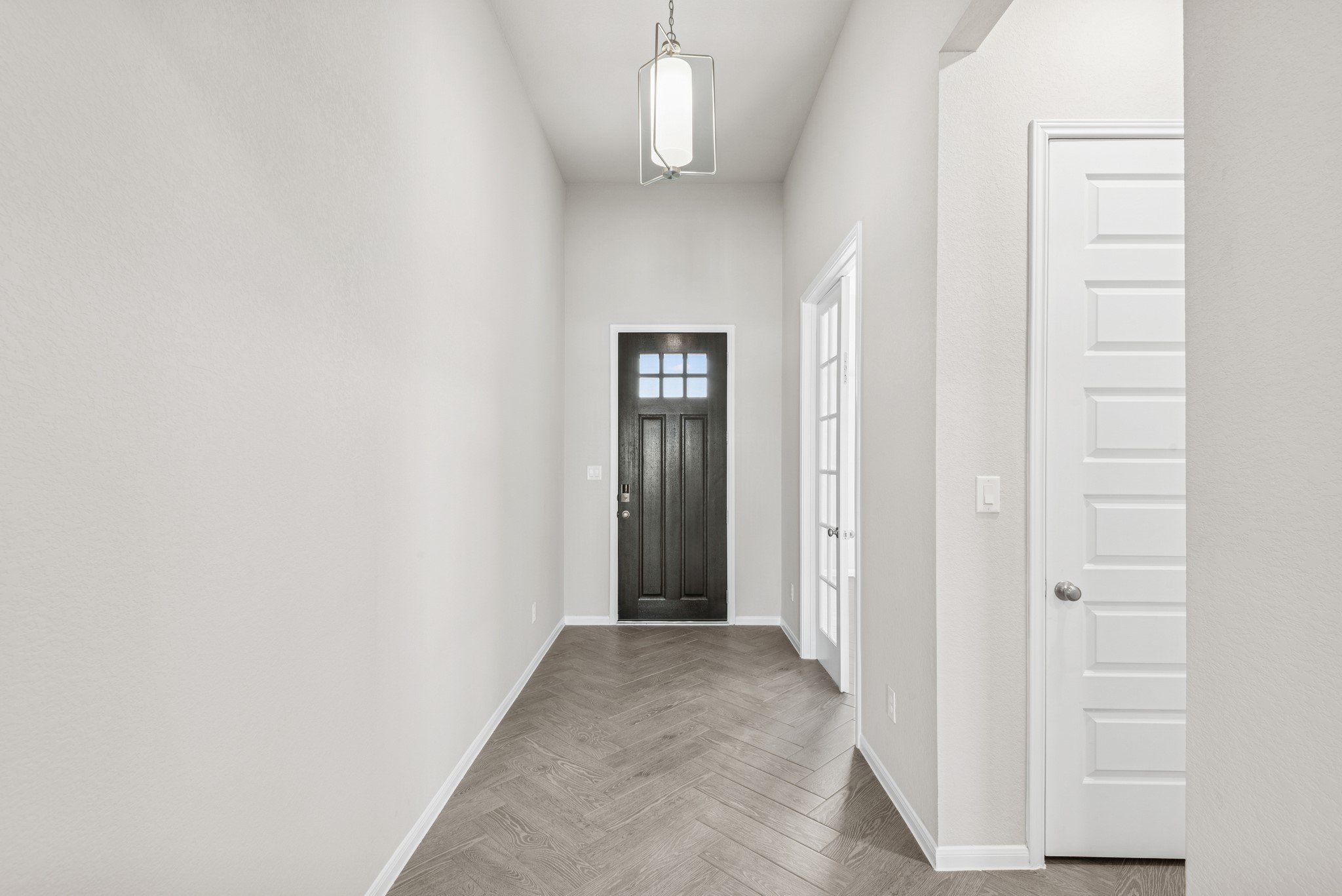 6715 Allens Landing Needville, TX 77461 - Photo 2 of 40 an entryway with a hallway